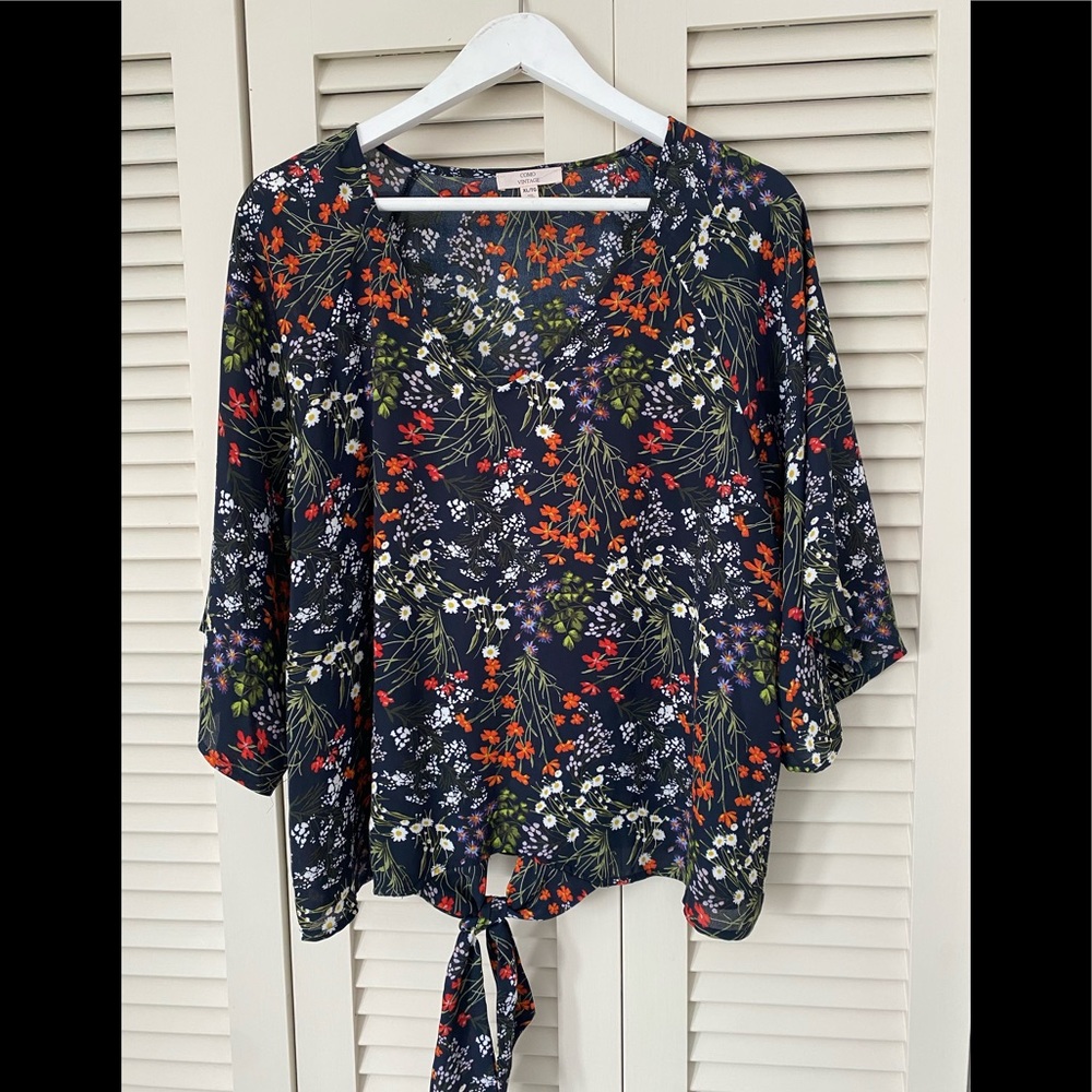 Batwing sleeve blouse.